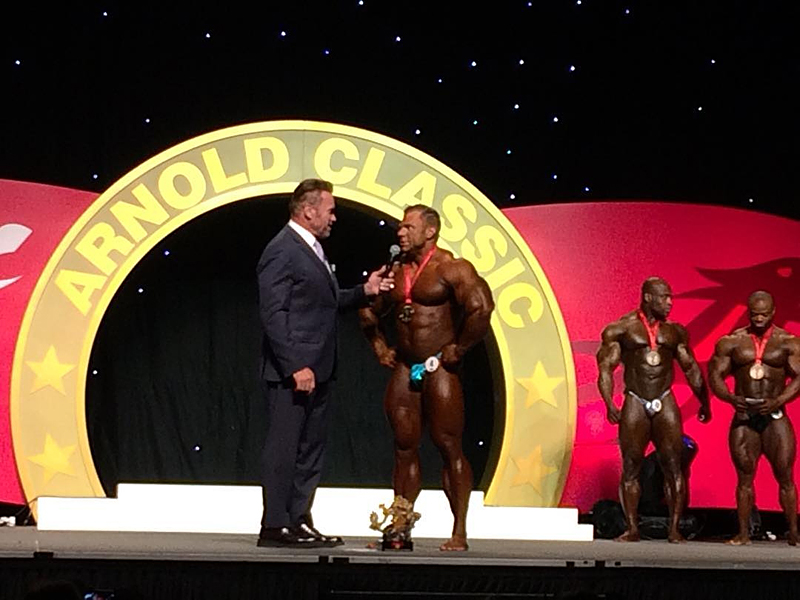 Arnold Schwarzenegger, Justin Compton