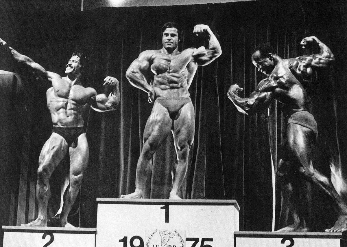 Ed Corney, Franco Columbu a Albert Beckles na Mr. Olympia 1975